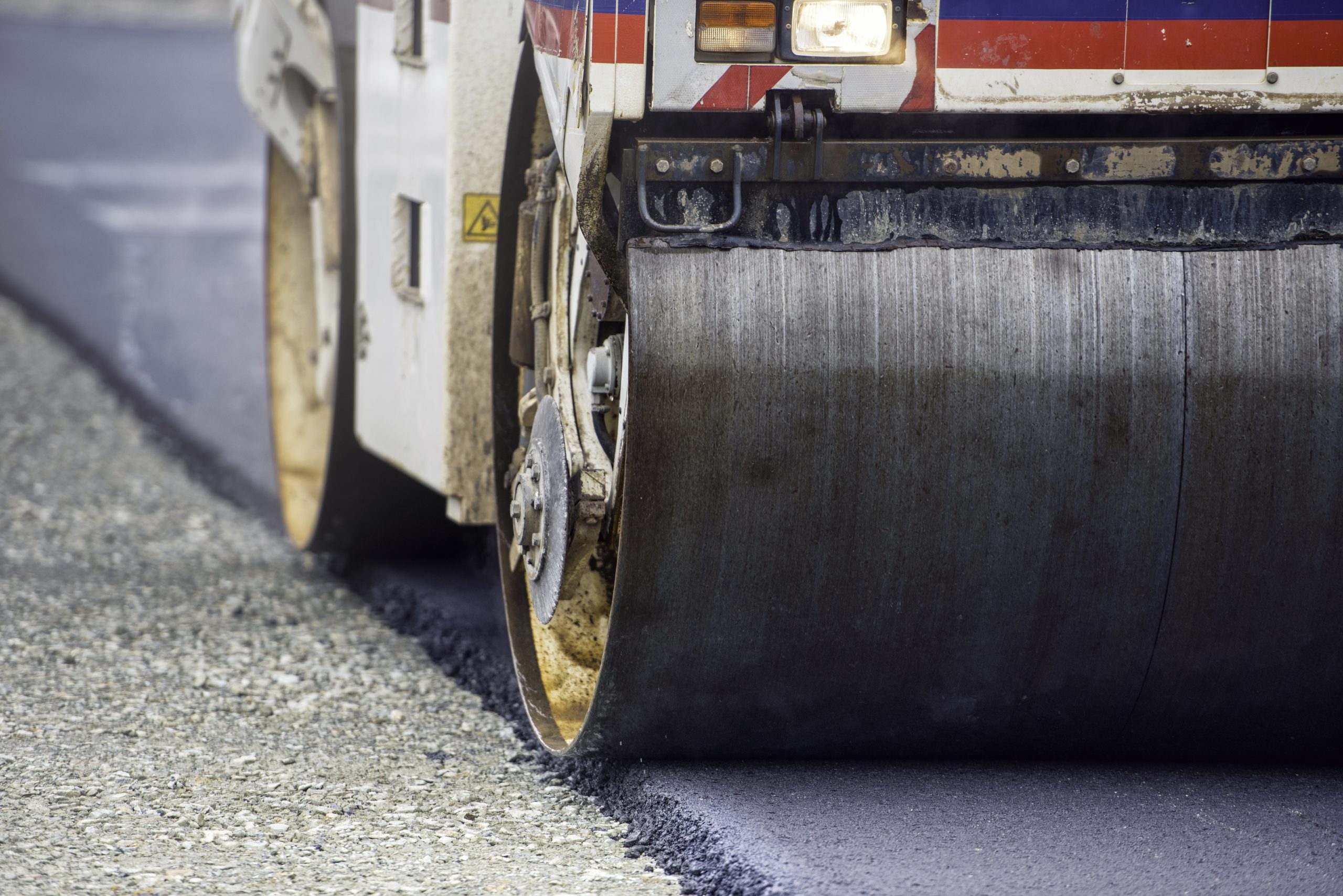 Heavy Vibration roller compactor at asphalt pavement works for road and highway construction Domestic Road Surfacing Commercial Road Surfacnig